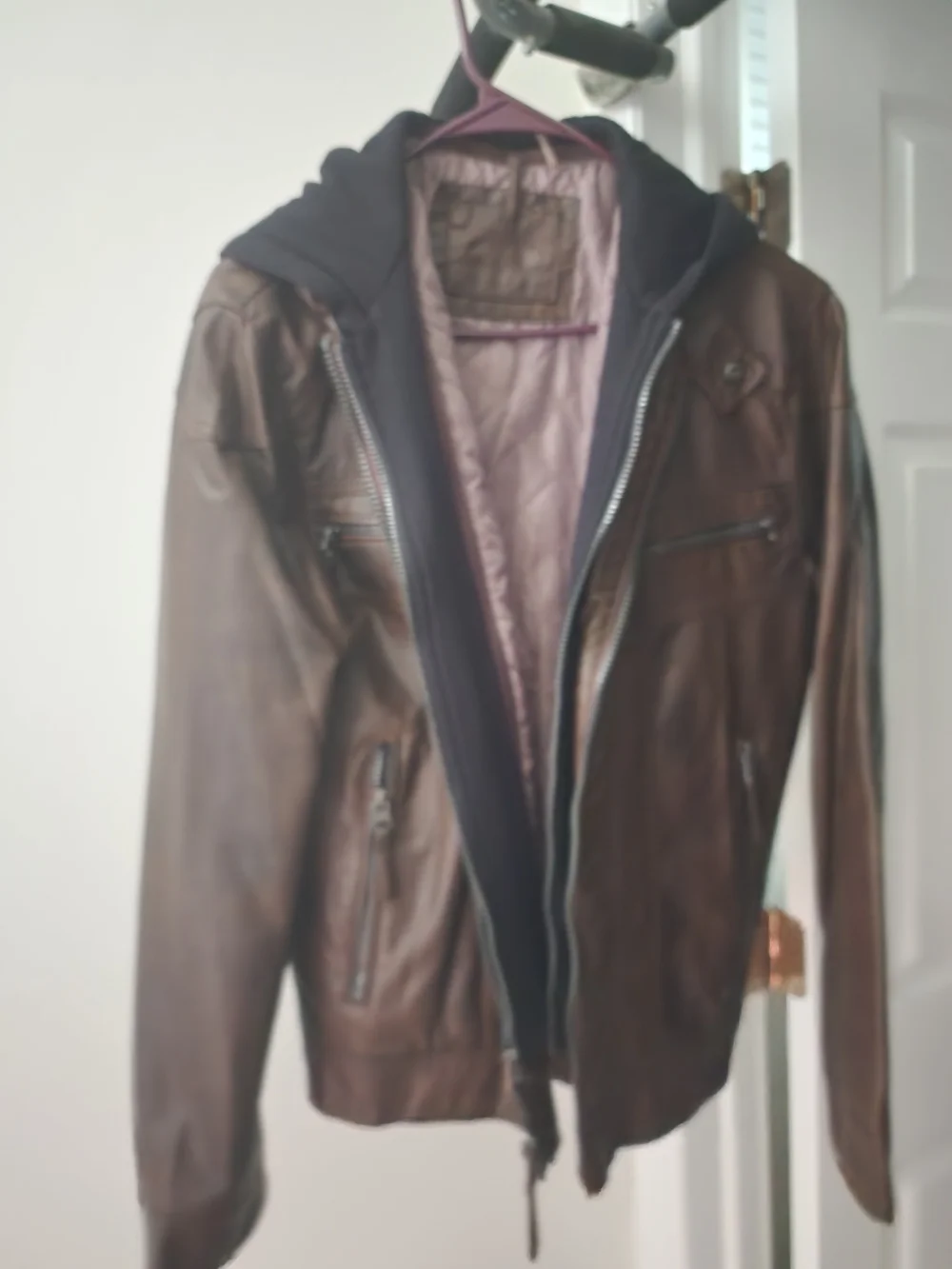 Calvin Klein Dark Brown Leather Bomber Jacket with Black Hoodie Liner.Never Worn